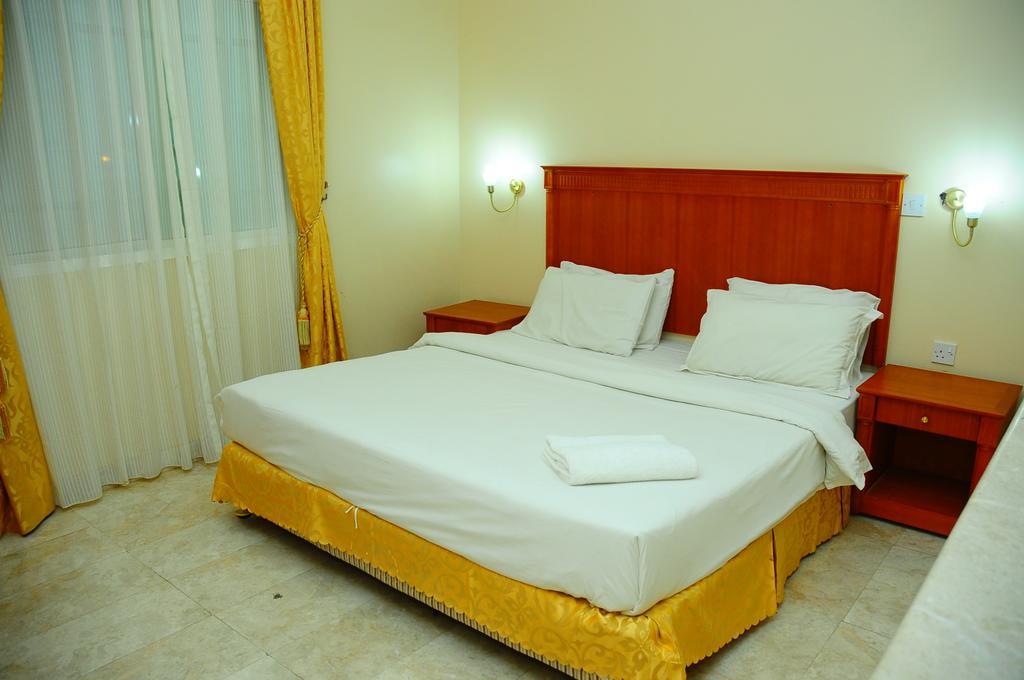 Al Faisal Hotel Suites Sur Rum bild