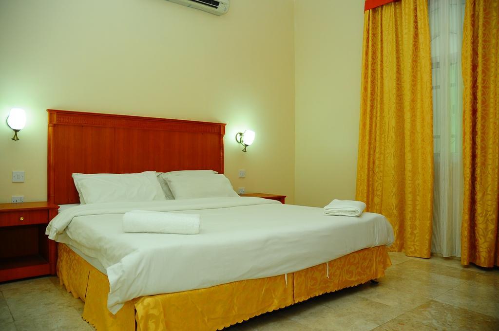 Al Faisal Hotel Suites Sur Rum bild